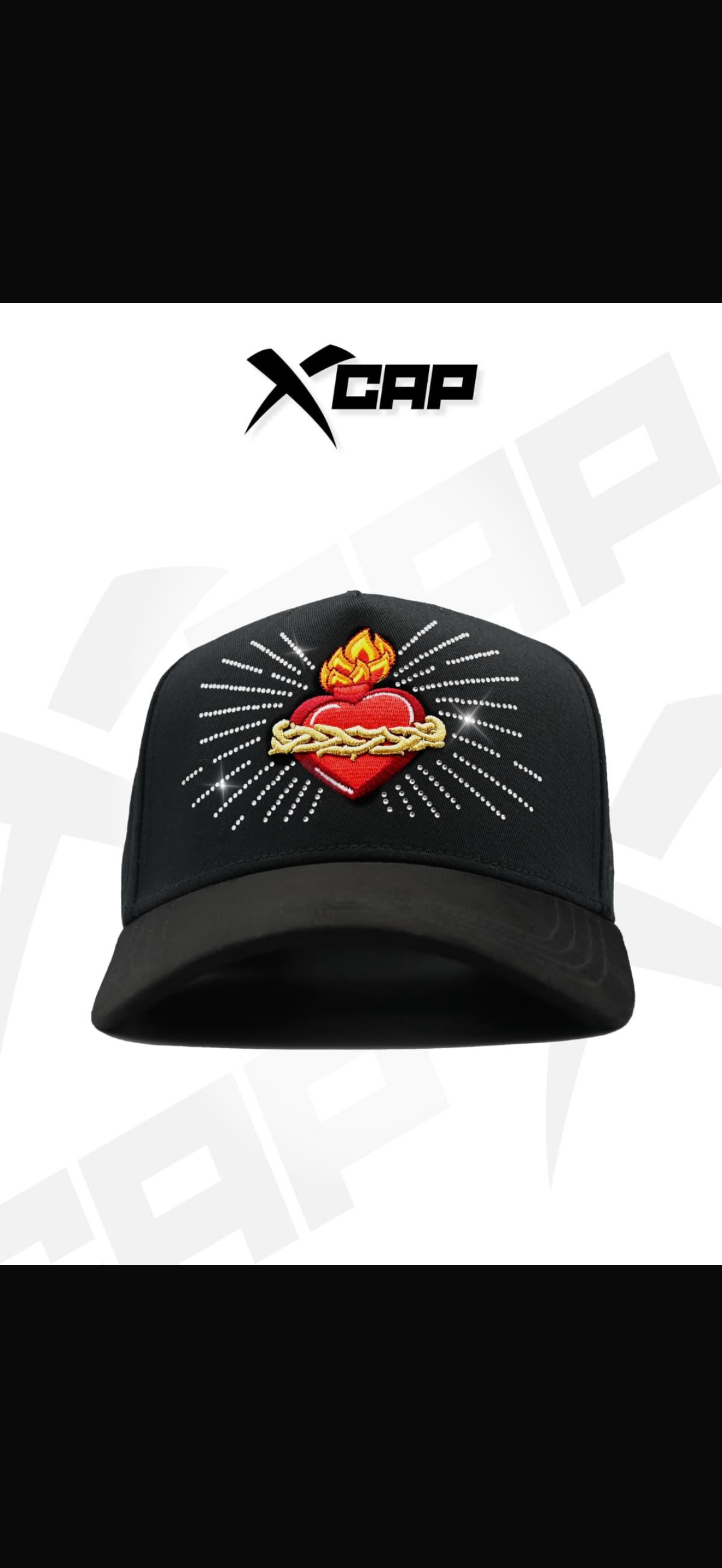 X caps sagrado corazón