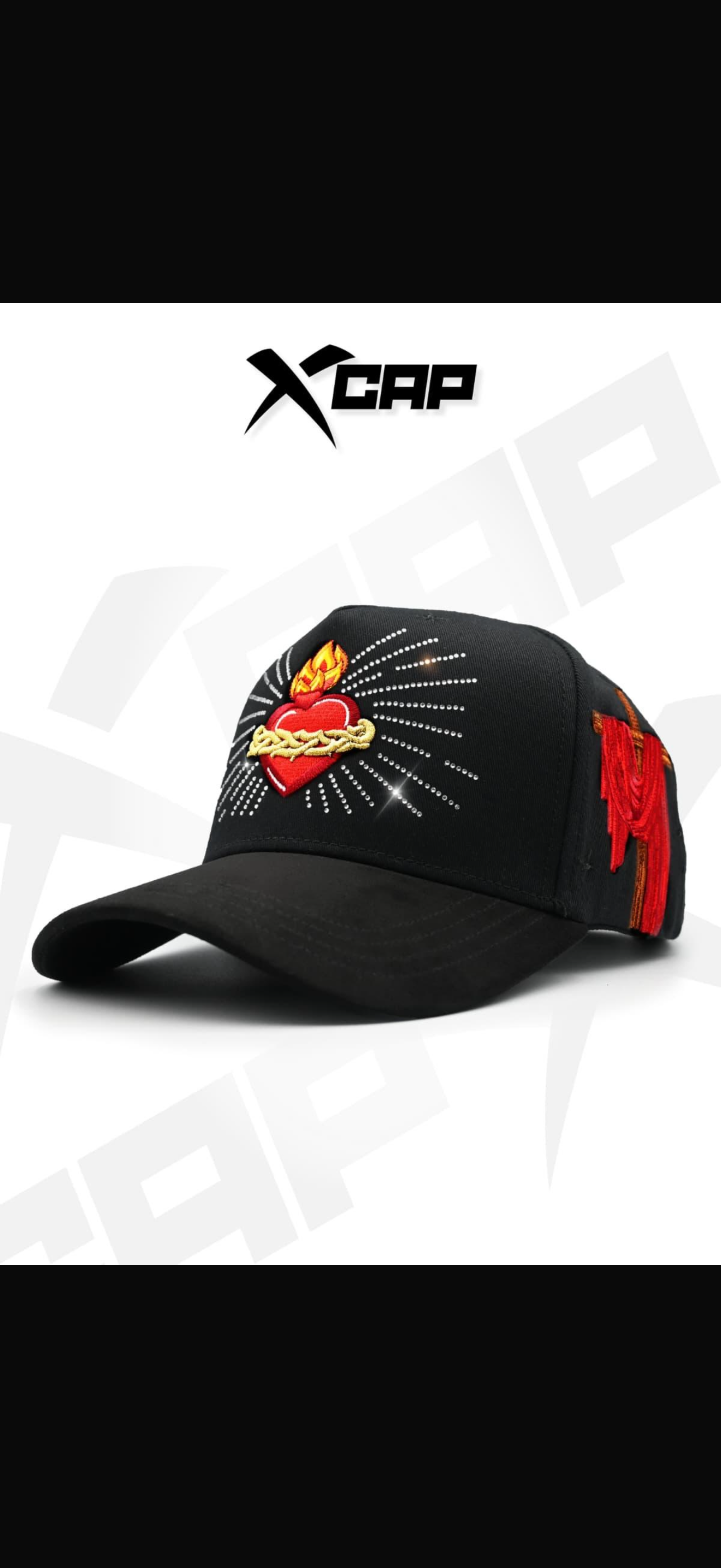 X caps sagrado corazón