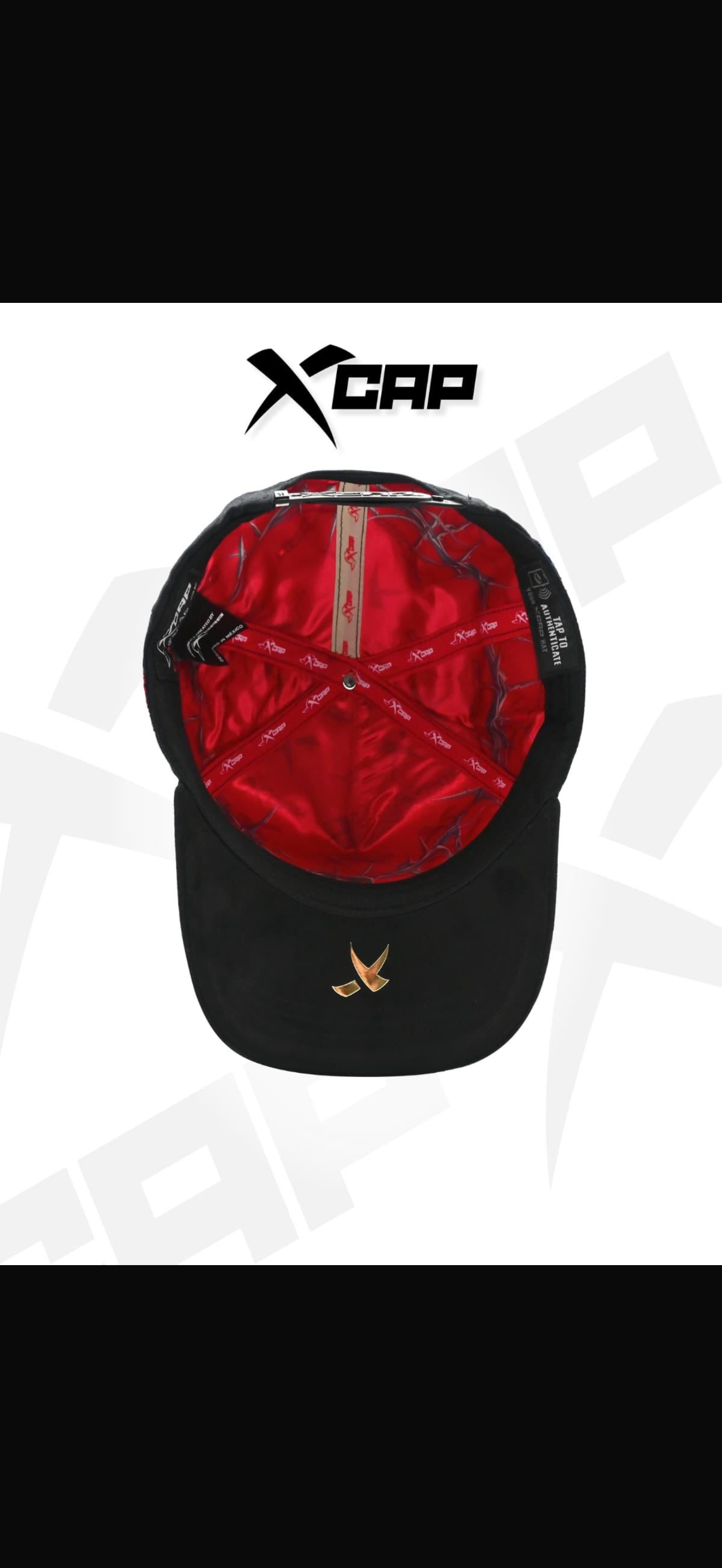 X caps sagrado corazón